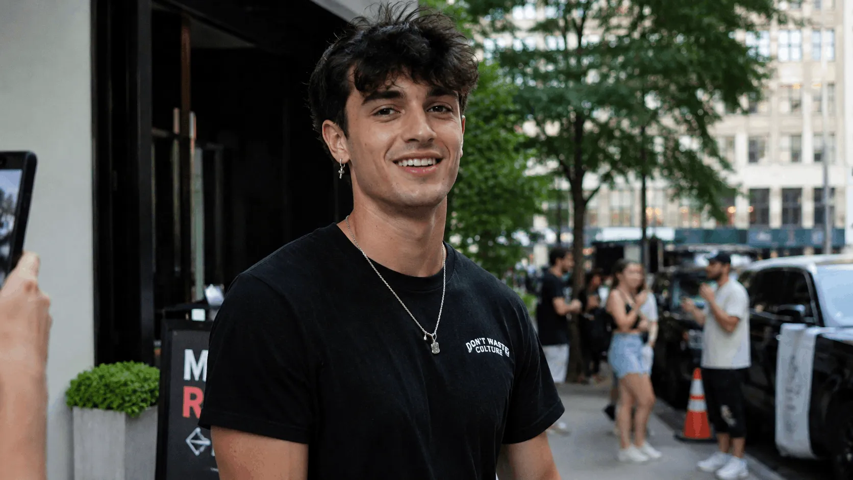 Bryce Hall net worth photo of the social media star outdoors