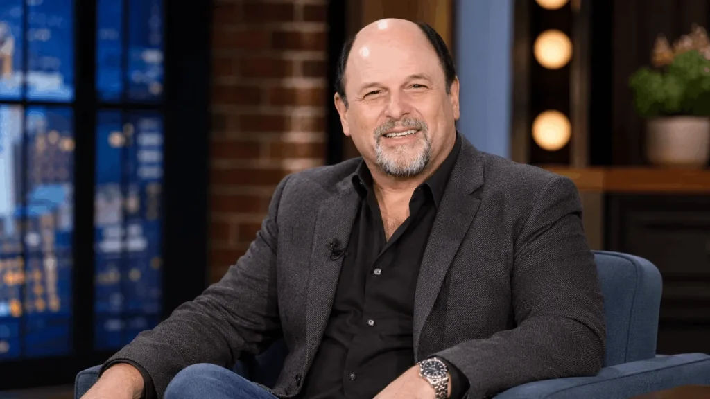 Director's chair on stage reflecting Jason Alexander's current theater work